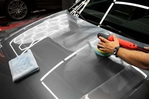 Polishing removes swirl marks and oxidation, restoring deep gloss and paint clarity with professional detailer